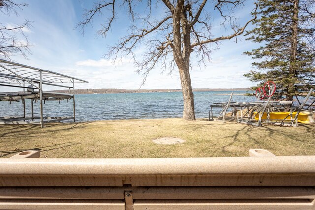 8236 Lake Carlos Dr NE, Carlos, MN 56319 - view of green lawn featuring a water view