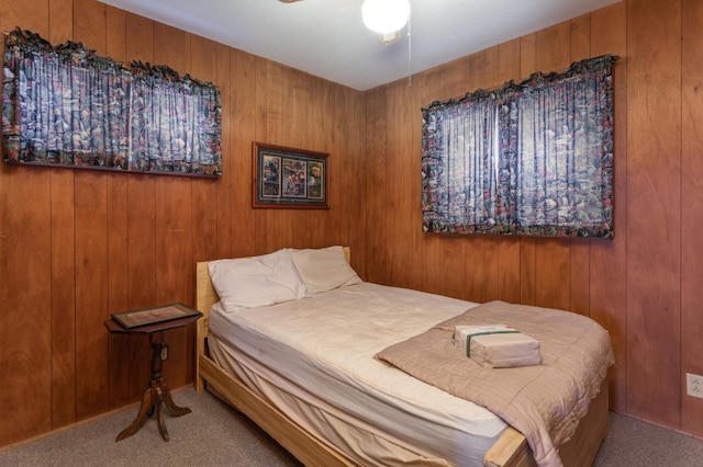 8236 Lake Carlos Dr NE, Carlos, MN 56319 - carpeted bedroom featuring wood walls
