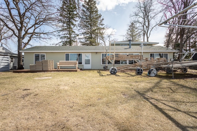 8236 Lake Carlos Dr NE, Carlos, MN 56319 - rear view of house featuring a yard and a shingled roof