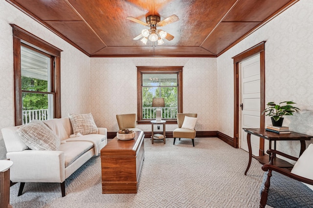 3220 50th Ave, Cady Twp, WI 54749 - living room with healthy amount of natural light, light carpet, ceiling fan, ornamental molding, and wallpapered walls
