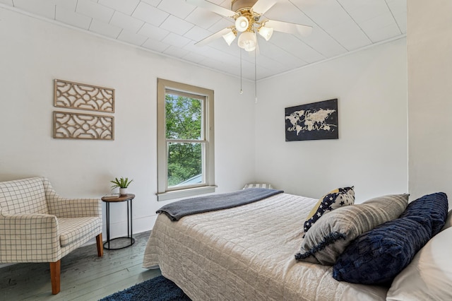 3220 50th Ave, Cady Twp, WI 54749 - bedroom with wood-type flooring and ceiling fan