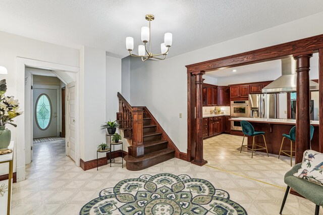 3220 50th Ave, Knapp, WI 54749 - foyer entrance featuring light floors, a chandelier, and stairs