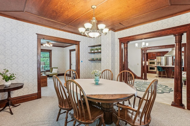 3220 50th Ave, Knapp, WI 54749 - dining area with a chandelier, light colored carpet, decorative columns, wood ceiling, and wallpapered walls