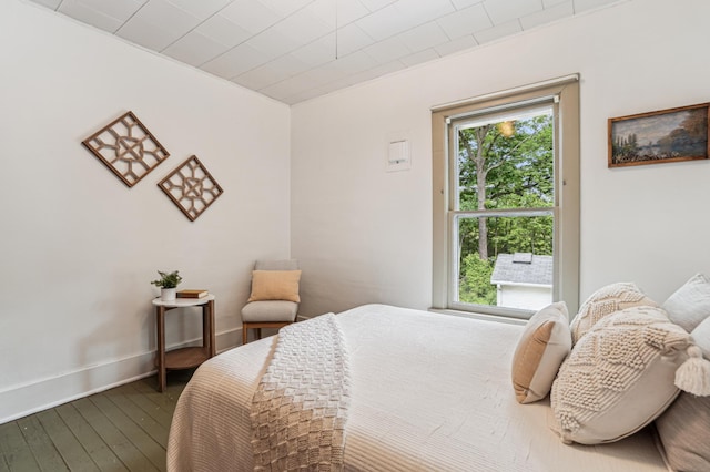 3220 50th Ave, Knapp, WI 54749 - bedroom featuring hardwood / wood-style flooring and baseboards