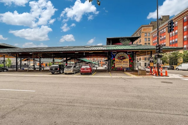 view of building exterior with covered parking