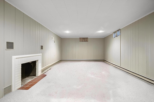 unfurnished living room featuring a fireplace