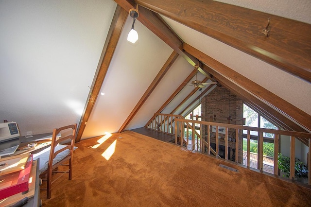 additional living space featuring carpet floors, vaulted ceiling with beams, and ceiling fan