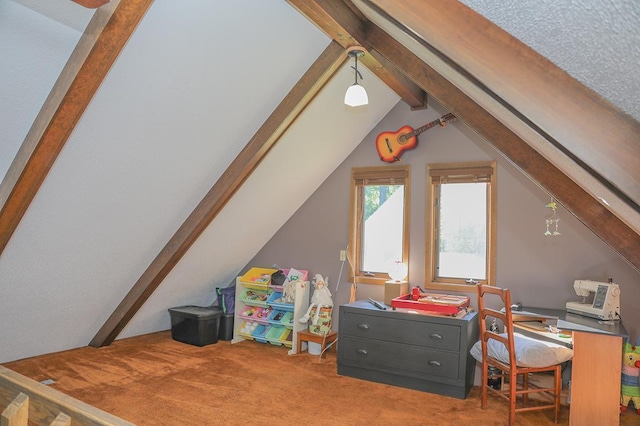 interior space featuring lofted ceiling with beams and carpet floors