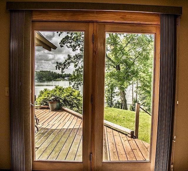 doorway featuring a water view