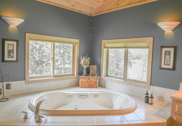 full bathroom featuring wooden ceiling, a tub with jets, lofted ceiling, and plenty of natural light