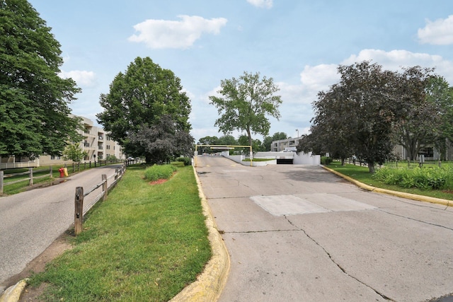 4110 Rahn Rd Unit 124, Eagan, MN 55122 - view of concrete road featuring curbs