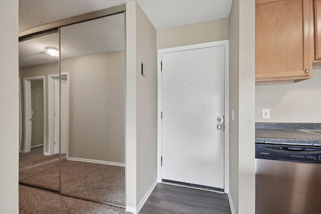 4110 Rahn Rd Unit 124, Eagan, MN 55122 - corridor featuring a textured ceiling and baseboards