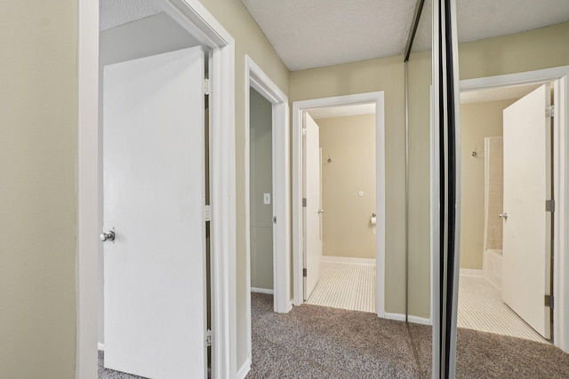 4110 Rahn Rd Unit 124, Eagan, MN 55122 - hallway with carpet flooring and a textured ceiling