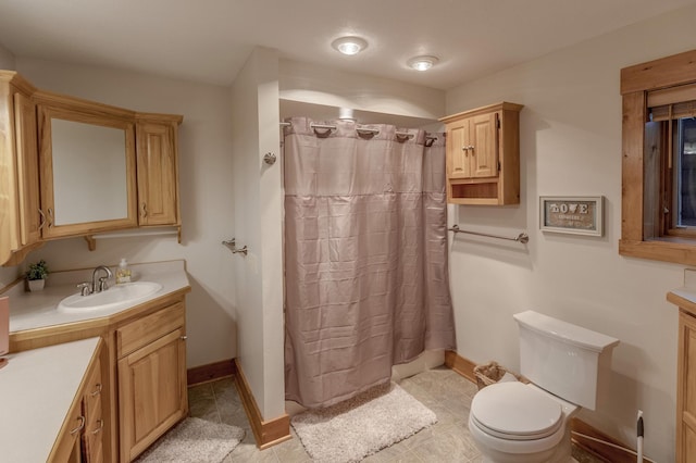 31690 Large Pine Trl, Laporte, MN 56461 - full bath with vanity, toilet, baseboards, and curtained shower