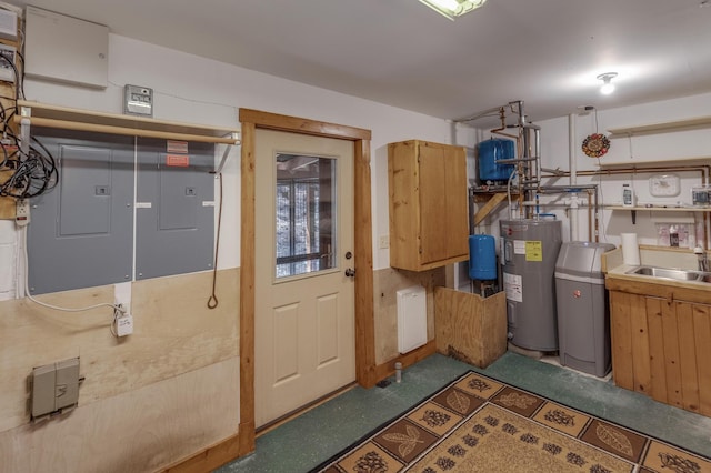 31690 Large Pine Trl, Laporte, MN 56461 - garage featuring electric water heater, electric panel, and a sink