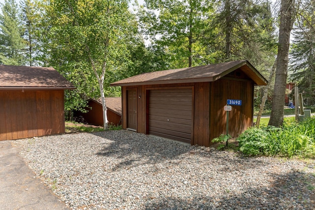 31690 Large Pine Trl, Laporte, MN 56461 - detached garage featuring driveway