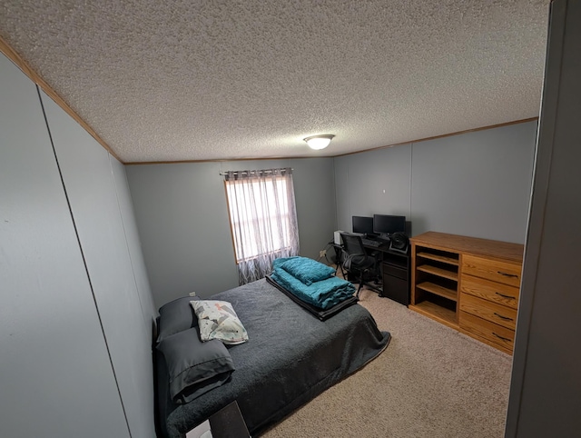 carpeted bedroom featuring crown molding and a textured ceiling