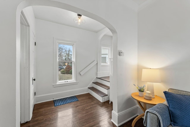 4001 Sheridan Ave S, Minneapolis, MN 55410 - stairs featuring wood finished floors, baseboards, and arched walkways