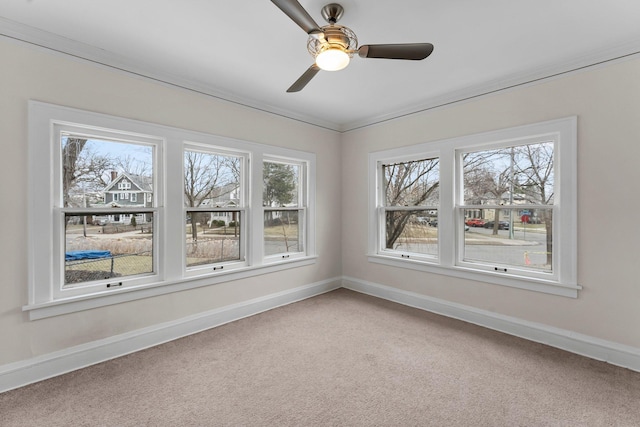 4001 Sheridan Ave S, Minneapolis, MN 55410 - carpeted empty room featuring baseboards, crown molding, and ceiling fan