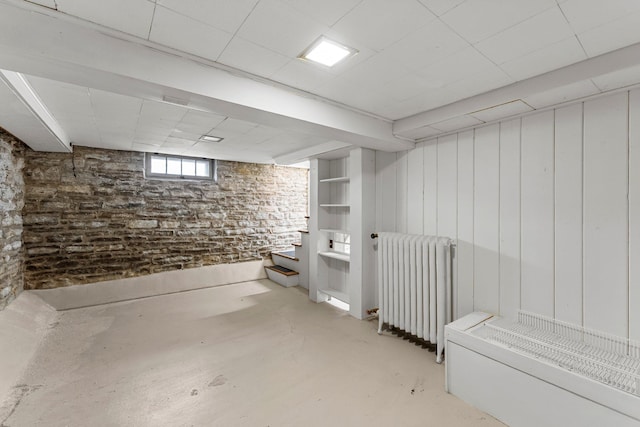 4001 Sheridan Ave S, Minneapolis, MN 55410 - basement featuring radiator and stairs