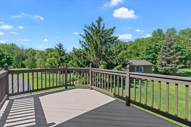 15210 Painters Lane Cir N, West Lakeland Twp, MN 55082 - wooden deck featuring a yard and an outbuilding