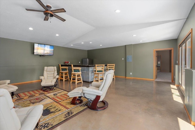 15210 Painters Lane Cir N, West Lakeland Twp, MN 55082 - living area featuring lofted ceiling, ceiling fan, finished concrete floors, recessed lighting, and baseboards