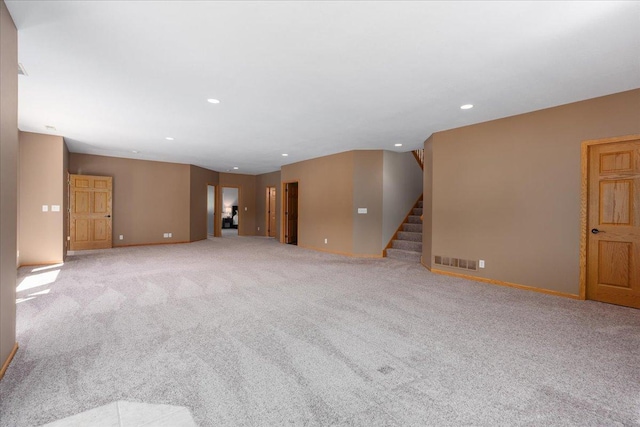 15210 Painters Lane Cir N, West Lakeland Twp, MN 55082 - carpeted spare room featuring stairway, recessed lighting, and baseboards