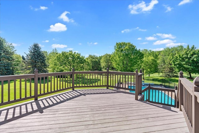 15210 Painters Lane Cir N, West Lakeland Twp, MN 55082 - wooden deck with a yard and view of wooded area