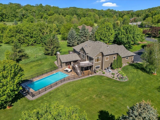 15210 Painters Lane Cir N, West Lakeland Twp, MN 55082 - view from above of property featuring a pool area and a forest