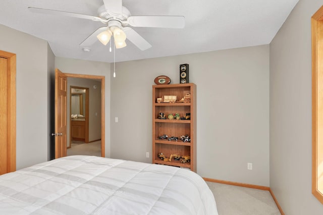 bedroom with baseboards, a ceiling fan, and light carpet