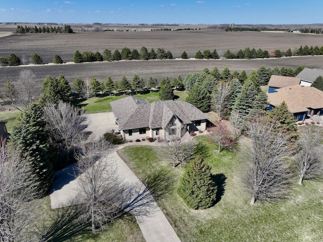 birds eye view of property featuring a rural view