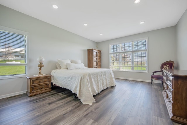 12446 190th St, Page Twp, MN 56353 - bedroom featuring dark wood finished floors, baseboards, and recessed lighting