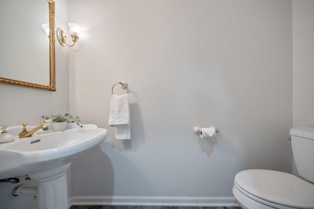 12446 190th St, Page Twp, MN 56353 - bathroom with toilet and a sink
