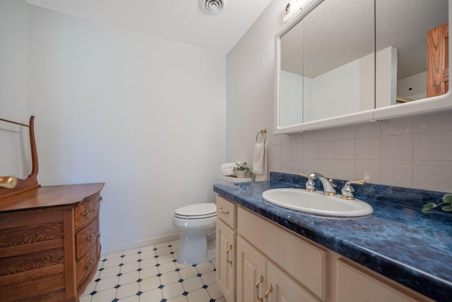 12446 190th St, Page Twp, MN 56353 - bathroom featuring vanity, tile patterned floors, and decorative backsplash