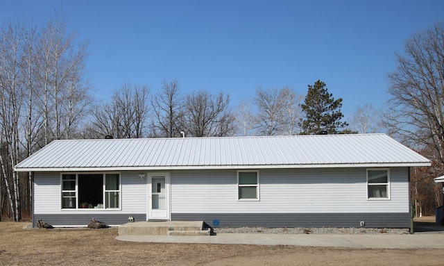 view of front of home featuring metal roof