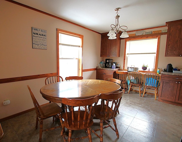 dining room with crown molding