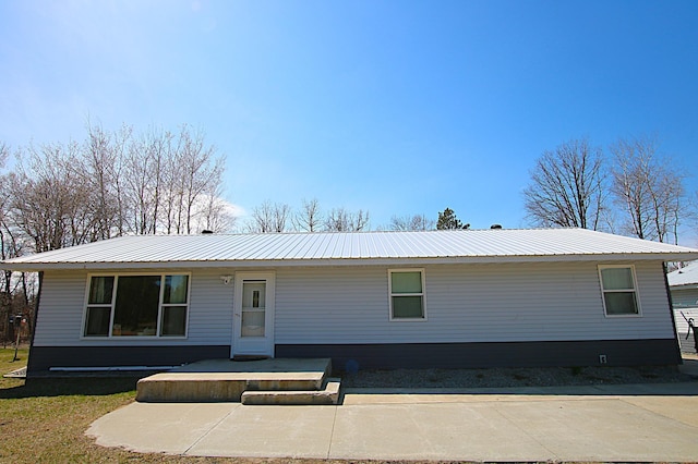 view of front of property featuring metal roof