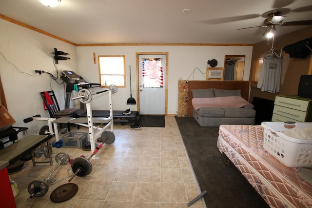 bedroom featuring an AC wall unit, a ceiling fan, ornamental molding, and tile patterned floors