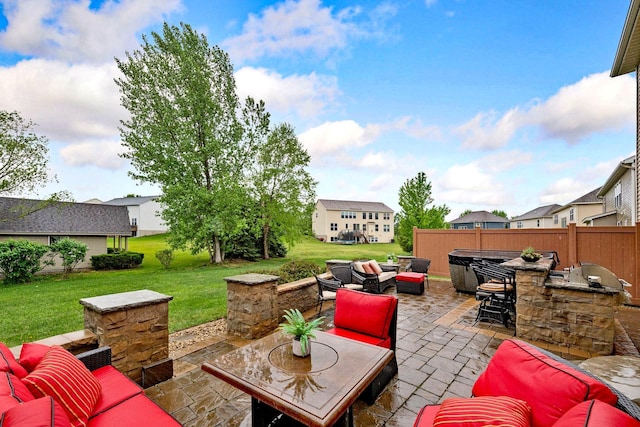 view of patio with an outdoor hangout area, area for grilling, and a residential view
