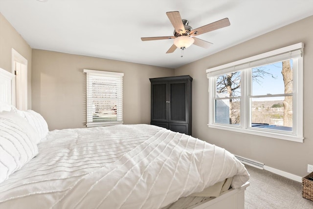 312 Walnut St, Taylors Falls, MN 55084 - bedroom with carpet, baseboards, and ceiling fan