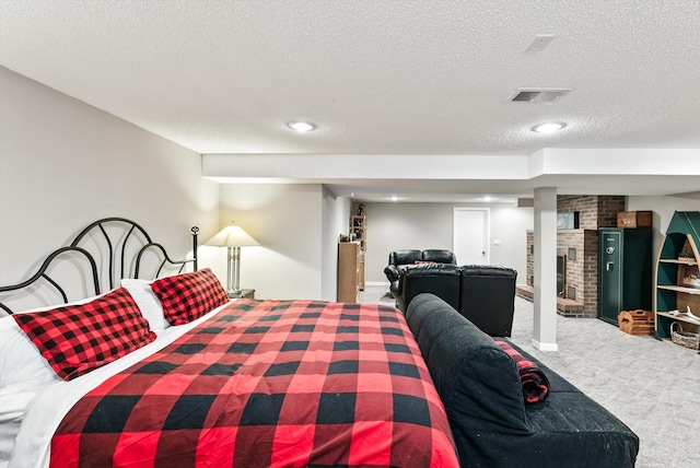 312 Walnut St, Taylors Falls, MN 55084 - carpeted bedroom featuring a textured ceiling, a fireplace, and recessed lighting