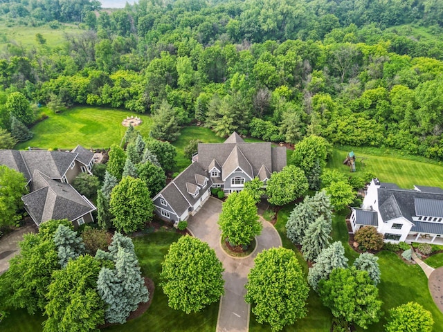 9726 Whistling Valley Rd, Lake Elmo, MN 55042 - drone / aerial view of a heavily wooded area
