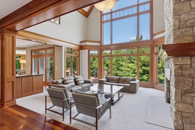 9726 Whistling Valley Rd, Lake Elmo, MN 55042 - living room with a high ceiling and wood finished floors