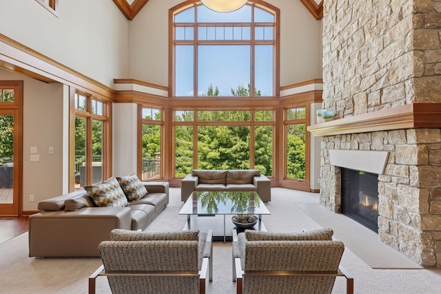 9726 Whistling Valley Rd, Lake Elmo, MN 55042 - carpeted living room with a towering ceiling and a stone fireplace