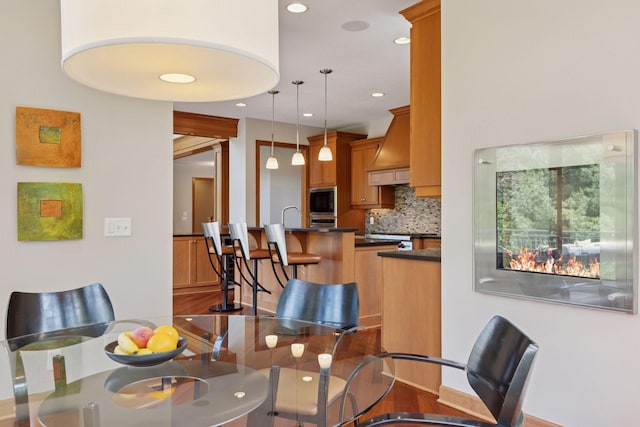 9726 Whistling Valley Rd, Lake Elmo, MN 55042 - dining area with recessed lighting