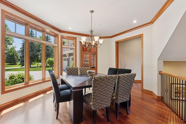 9726 Whistling Valley Rd, Lake Elmo, MN 55042 - dining space featuring a chandelier, ornamental molding, wood finished floors, baseboards, and recessed lighting