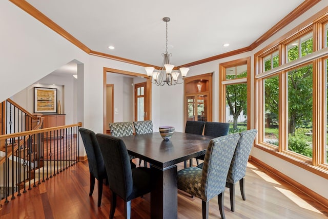 9726 Whistling Valley Rd, Lake Elmo, MN 55042 - dining room with a chandelier, ornamental molding, light wood-style floors, baseboards, and recessed lighting