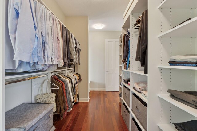 9726 Whistling Valley Rd, Lake Elmo, MN 55042 - spacious closet featuring wood finished floors