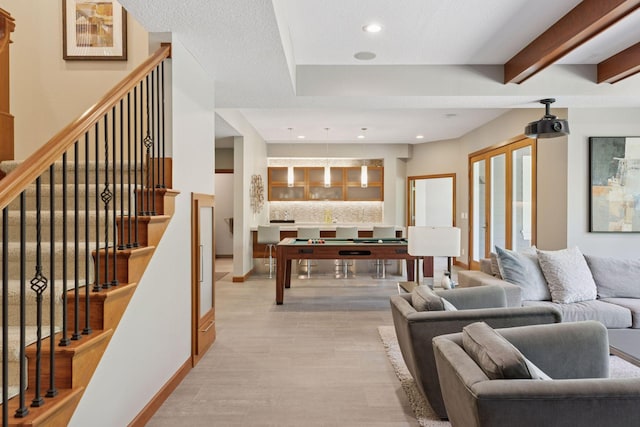 9726 Whistling Valley Rd, Lake Elmo, MN 55042 - living area featuring billiards, recessed lighting, light wood finished floors, stairway, and baseboards
