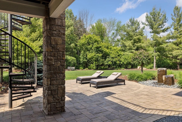 9726 Whistling Valley Rd, Lake Elmo, MN 55042 - view of patio featuring stairway